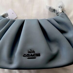 Brand new Coach pleated crossbody purse